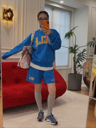 SPORTY & RICH - UCLA Ivy Crewneck in Blue