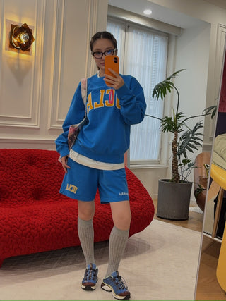 SPORTY & RICH - UCLA Ivy Crewneck in Blue