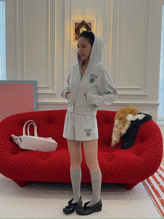 SPORTY & RICH - UCLA Crest Disco Short in Gray