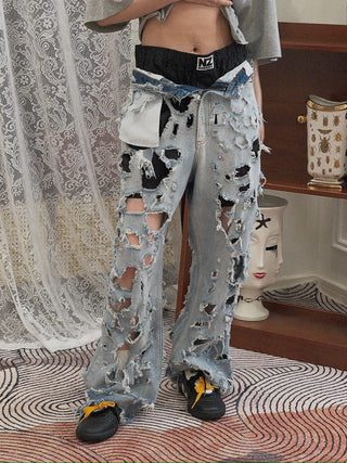 NATASHA ZINKO DESTROYED DENIM JEANS