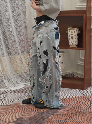 NATASHA ZINKO DESTROYED DENIM JEANS