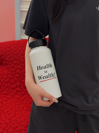 SPORTY & RICH - Health is Wealth Bottle
