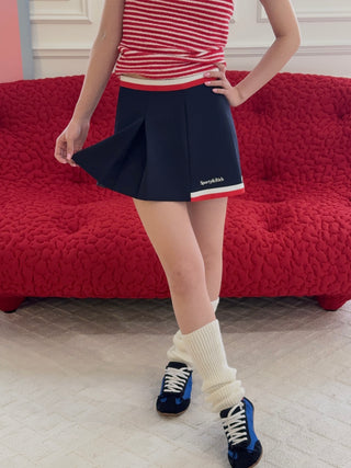 SPORTY & RICH - Serif Logo Mila Skirt in Navy