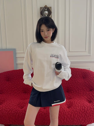 SPORTY & RICH - Serif Logo Mila Skirt in Navy