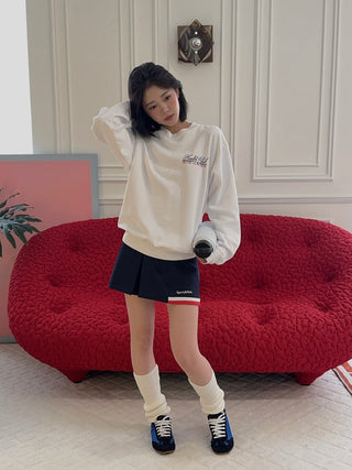 SPORTY & RICH - Serif Logo Mila Skirt in Navy