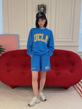 SPORTY & RICH - UCLA Ivy Crewneck in Blue