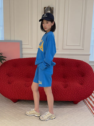 SPORTY & RICH - UCLA Ivy Crewneck in Blue