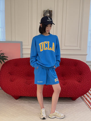 SPORTY & RICH - UCLA Ivy Crewneck in Blue